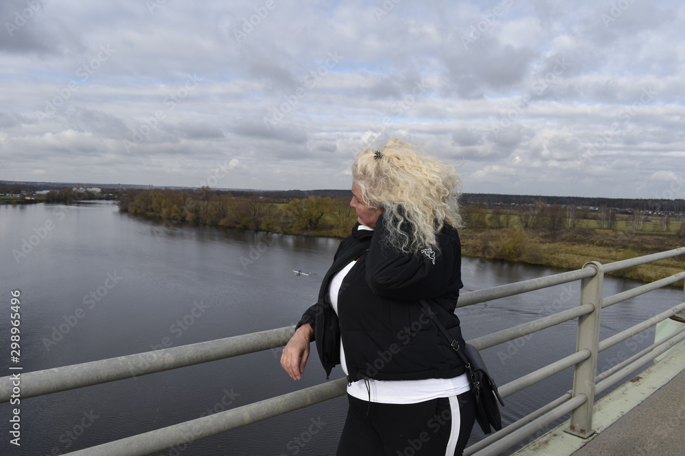 Fototapeta premium woman on the bridge