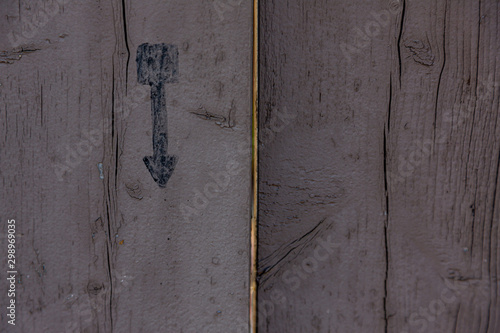weathered wood with arrow