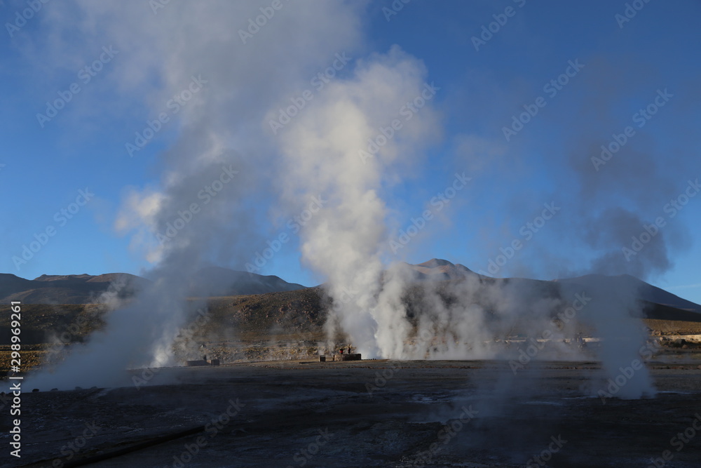 Chile, Atacama Desert, Geisers del Taito in the early morning. Vapors and fumes coming out of the ground. 
