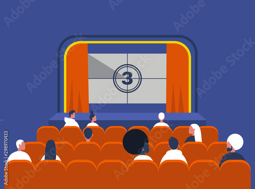 Entertainment and culture, Audience sitting in a vintage cinema theatre with red curtains and old fashion interior