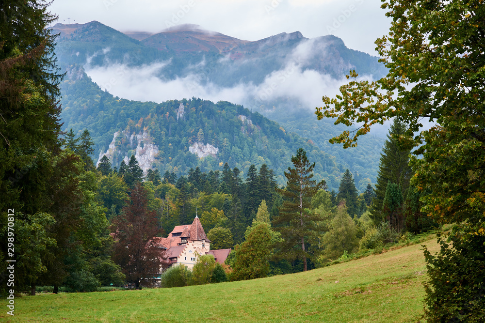 Pelesor Castle, residence of King Charles I in Sinaia, Romania. Autumn landscape of royal palace and park.