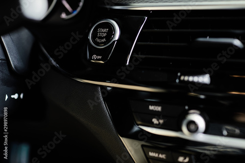 Start stop button in a car, luxury car interior concept