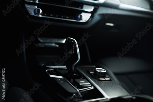 Luxury car inside, automatic gear stick of a modern car. © VAKSMANV