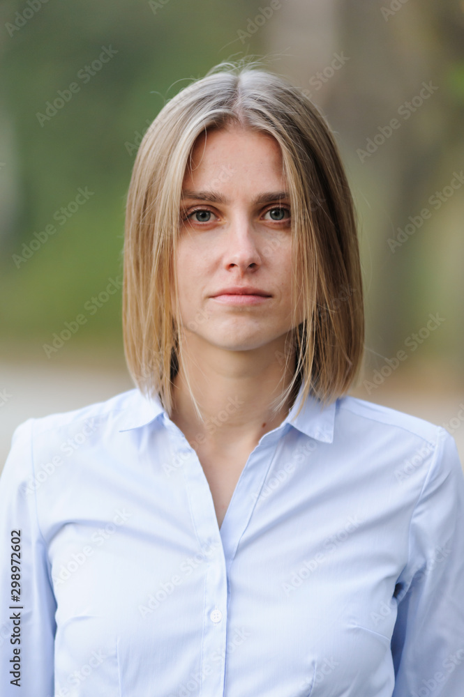 Blonde businesswoman portrait outdoor