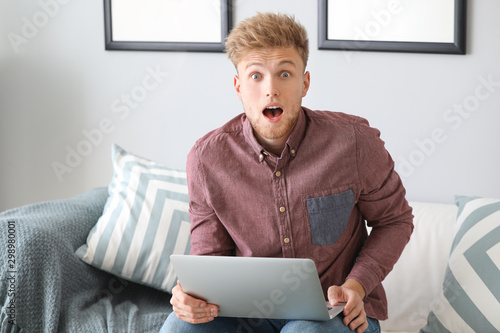 Portrait of surprised man w...