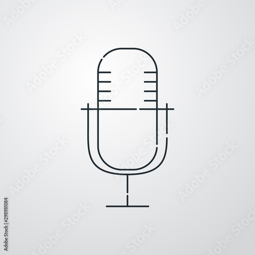 Icono plano lineal micrófono vintage en fondo gris