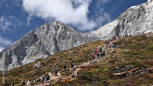Many tourists hiking in Daocheng Yading nature reserve