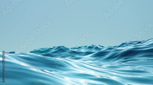 Sea, ocean, waves close-up view. Blue waves sea water. Blue crystal clear water. Rays of sunlight shining from above penetrate deep clear blue water. Sunlight beams underwater. 3D 4K animation