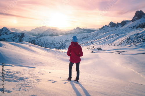 Young woman in snowy mounta...