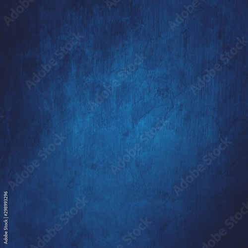 abstract blue and black background design or old blue paper with vintage grunge border texture and soft lighting on center © Arlenta Apostrophe