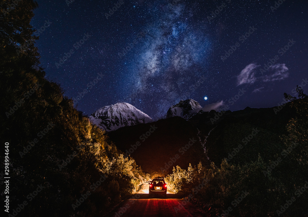 Car with Milkyway in Peruvian Andes.