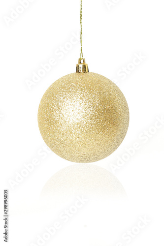 Golden Christmas shiny ball isolated on white background. Large glitter Christmas ornament.