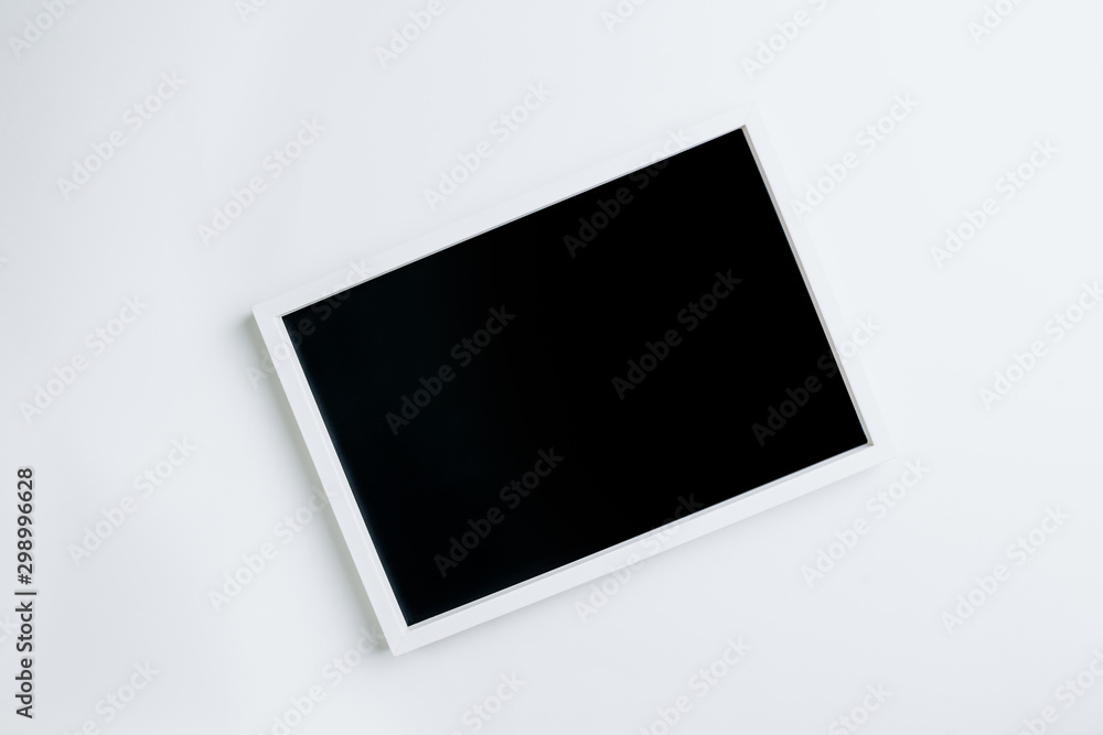 Minimal work space: blackboard on white background. Top view , flat lay. Copy space Minimal work space: blackboard on white background. Top view , flat lay. Copy space
