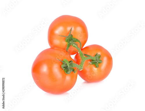 bunch of whole fresh tomatoes with stem on white background