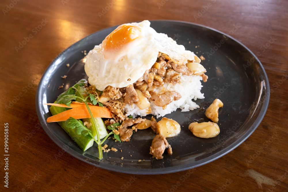 Pork fried rice with garlic, pepper and fried egg Pork fried rice with garlic, pepper and fried egg