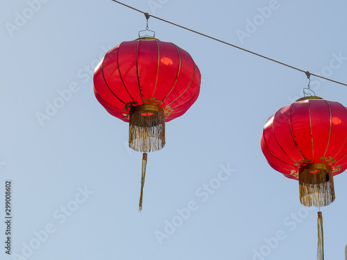 close up of red lanterns hanging in chinatown of san francisco