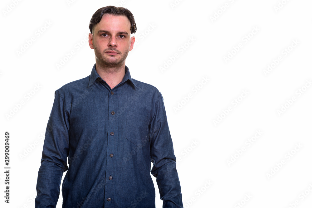 Fototapeta premium Portrait of businessman with casual shirt looking at camera