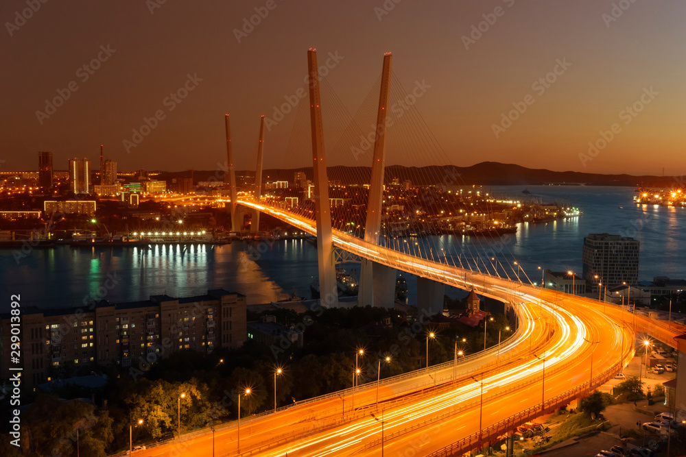 Sunset over Vladivostok and view of the Golden bridge