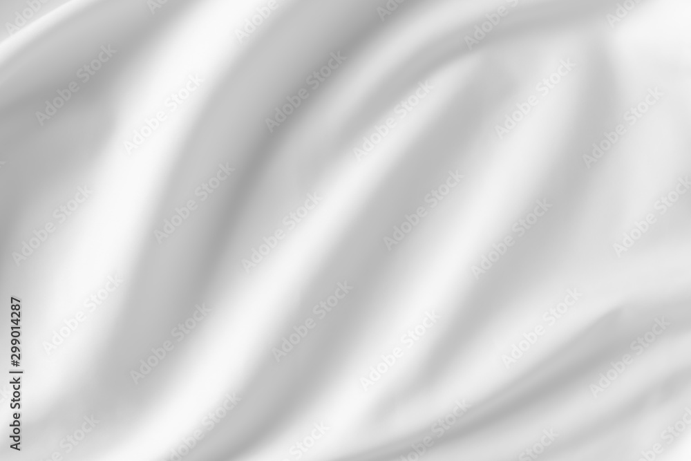 Abstract white fabric texture background. Cloth soft wave. Creases of satin, silk, and cotton. Abstract white fabric texture background. Cloth soft wave. Creases of satin, silk, and cotton.