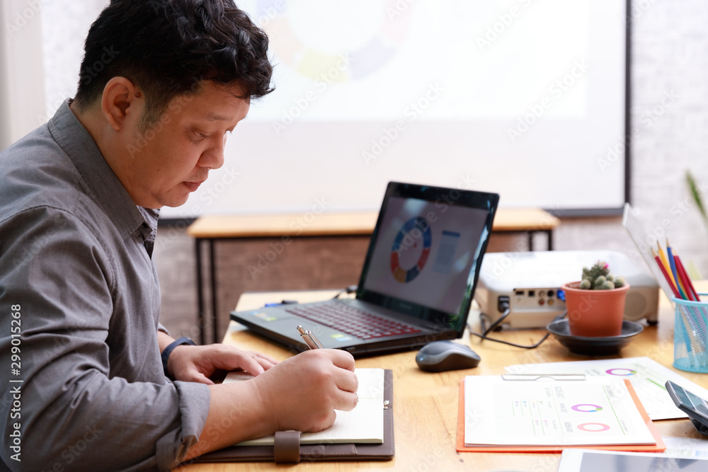 Small and Medium Enterprise Business concept of ,Businessman working with investment plan in office. Small and Medium Enterprise Business concept of ,Businessman working with investment plan in office.
