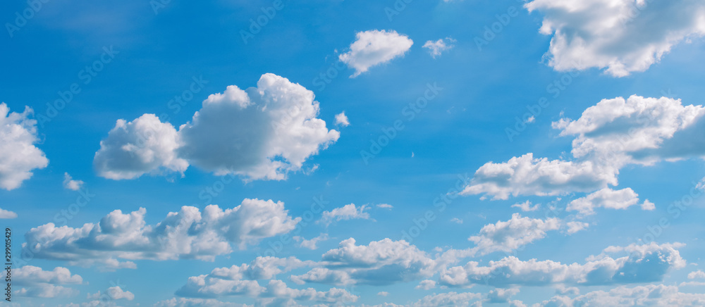 white cloud on blue sky background with sunshine