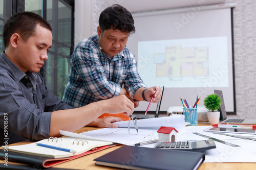 Wallpaper Mural Engineer and Architect concept, Engineer Architects  and Interior designer office team working with blueprints Torontodigital.ca