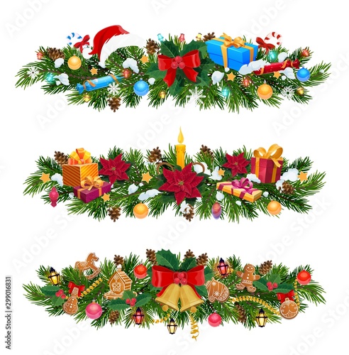 Christmas tree and holly garland with Xmas gifts