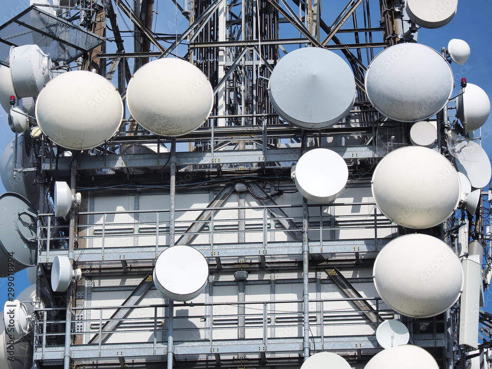 Foto de Group of antennas, satellite dishes for