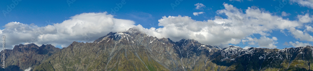 Mount Kazbegi is a dormant stratovolcano and one of the major mountains of the Caucasus located on the border of Georgias Kazbegi