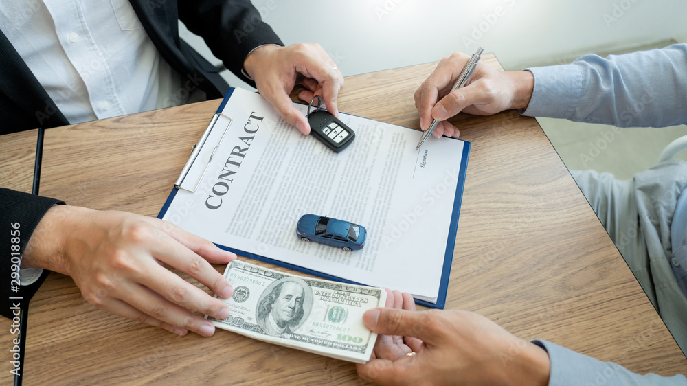 agent broker man holding document showing an transportation contract form to client ownership customer and salesman with car key. agent broker man holding document showing an transportation contract form to client ownership customer and salesman with car key.