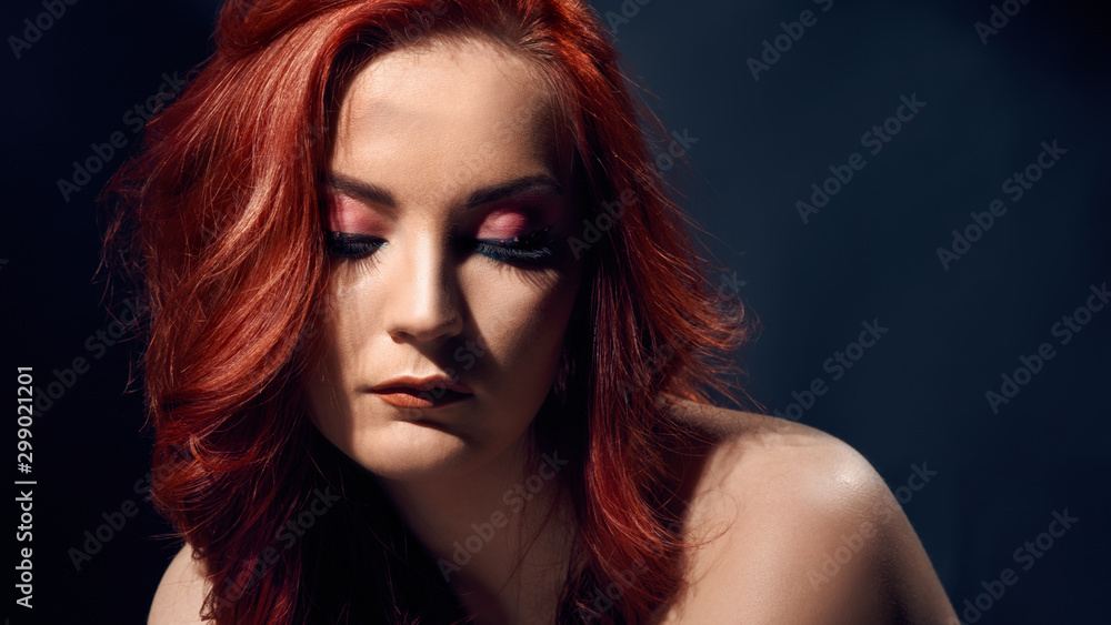 Sensual beautiful woman with bright evening makeup and stylish hairdo Sensual beautiful woman with bright evening makeup and stylish hairdo
