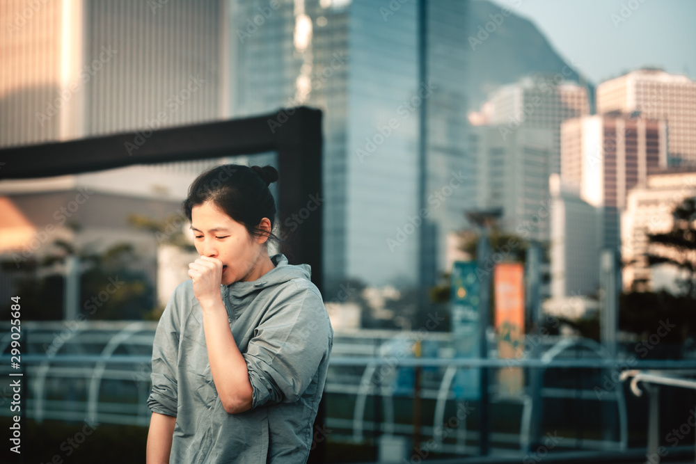 Fototapeta premium Woman feel sick in city