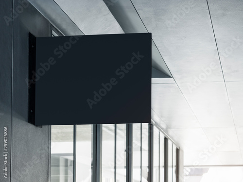 Shop sign Mock up black signage Shop sign on Building exterior photo