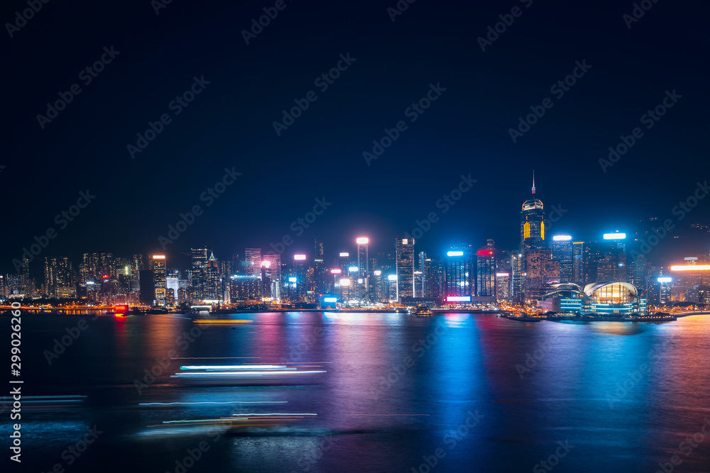 Cityscape and skyline at Victoria Harbour in Hong Kong city at Night