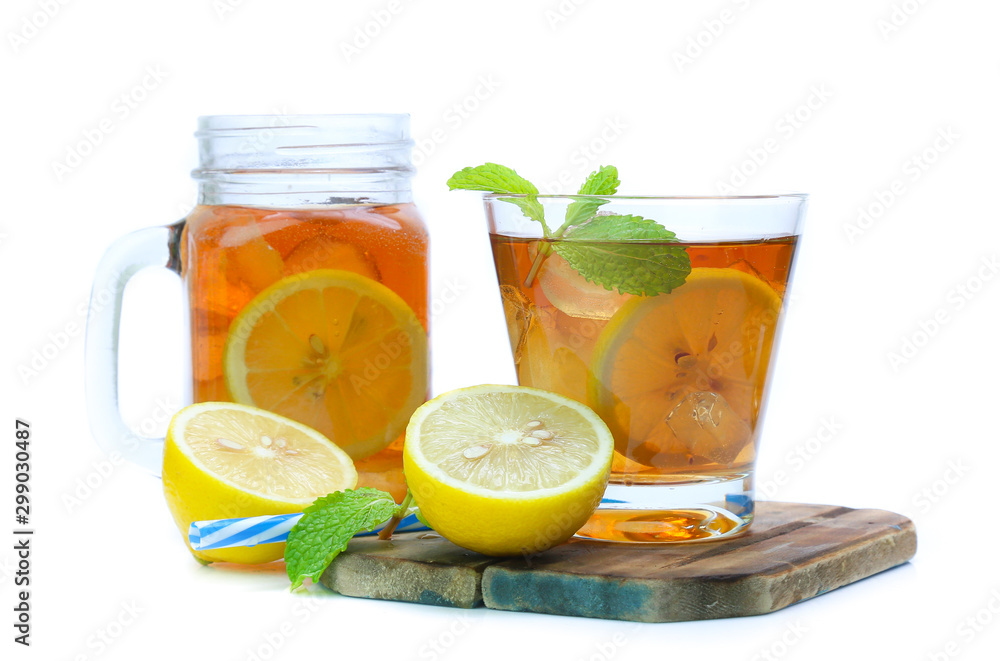 iced tea with lemon slices and mint on white background iced tea with lemon slices and mint on white background