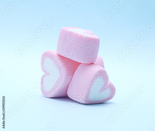 colorful marshmallows candy on blue background