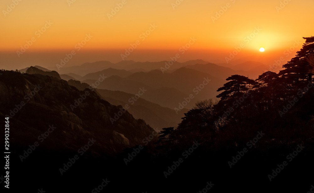 UNESCO World Heritage Site Natural beautiful landscape silhouette sunset Huangshan mountain scenery ( Yellow mountain ) in Anhui CHINA, It is a best of China major tourist destination.