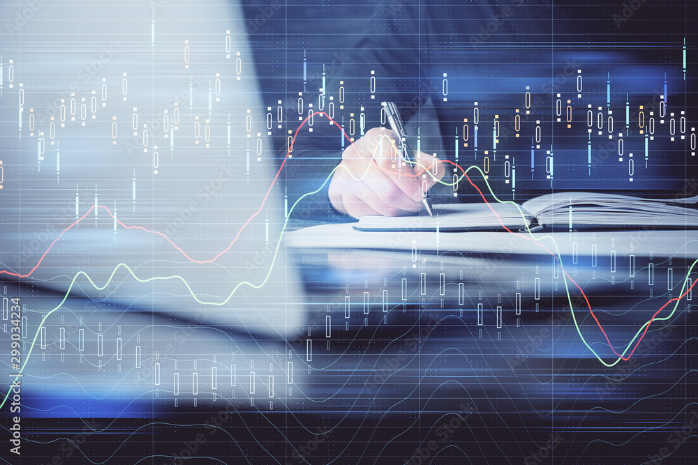 Double exposure of businessman with laptop and stock market forex chart. Double exposure of businessman with laptop and stock market forex chart.