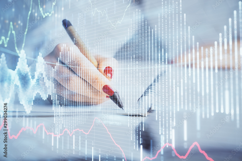 Double exposure of woman's hands making notes with forex graph hologram. Concept stock market analysis. Double exposure of woman's hands making notes with forex graph hologram. Concept stock market analysis.
