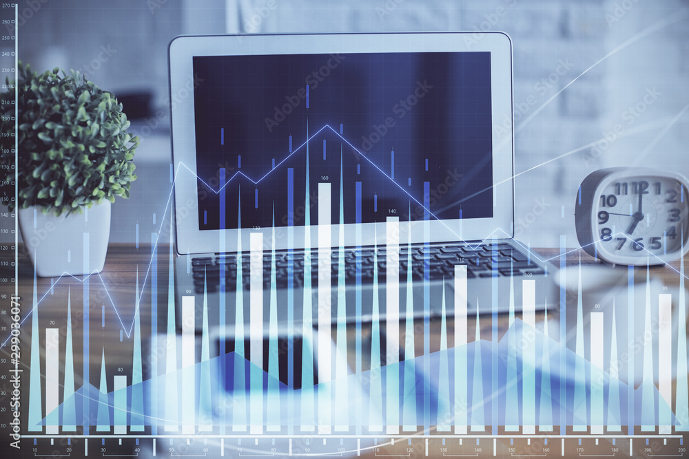 Stock market chart hologram drawn on personal computer background. Multi exposure. Concept of investment.
