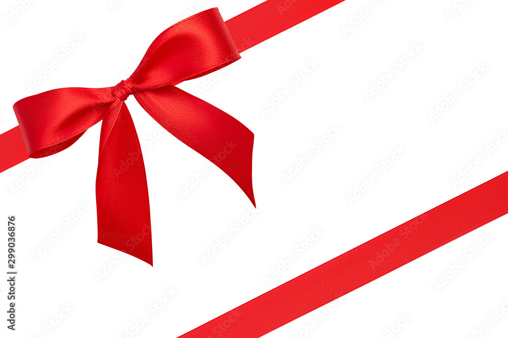 Top view on stunning beautiful bright simple perfect bow and two red diagonal silk ribbons with copy space isolated on white background. Greeting, invitation, discount card or gift wrapping concept Top view on stunning beautiful bright simple perfect bow and two red diagonal silk ribbons with copy space isolated on white background. Greeting, invitation, discount card or gift wrapping concept
