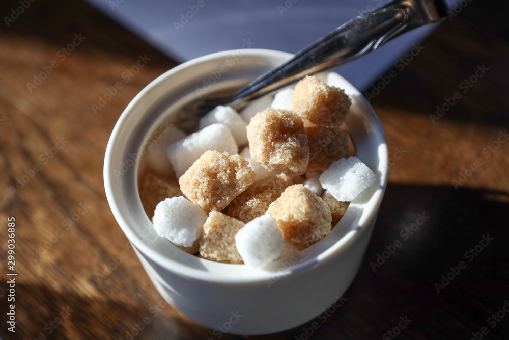 brown and white cane sugar cubes brown and white cane sugar cubes