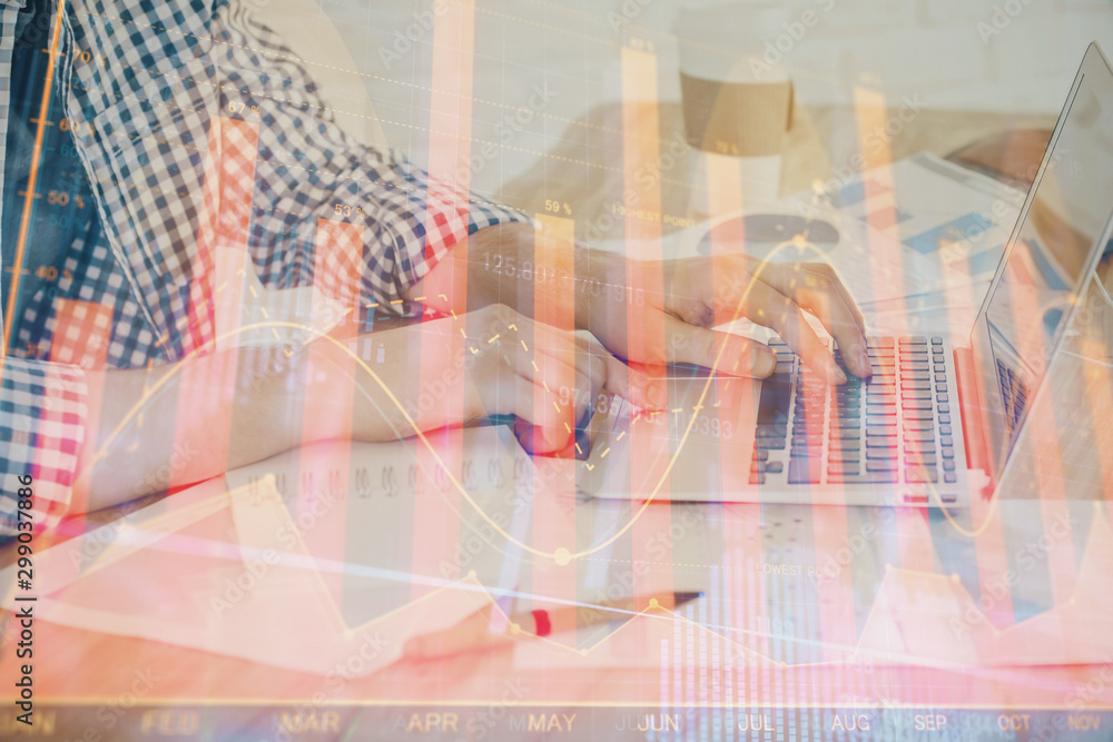 Multi exposure of stock market chart with man working on computer on background. Concept of financial analysis. Multi exposure of stock market chart with man working on computer on background. Concept of financial analysis.