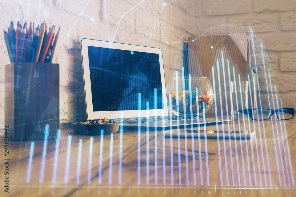 Double exposure of graph and financial info and work space with computer background. Concept of international online trading. Double exposure of graph and financial info and work space with computer background. Concept of international online trading.