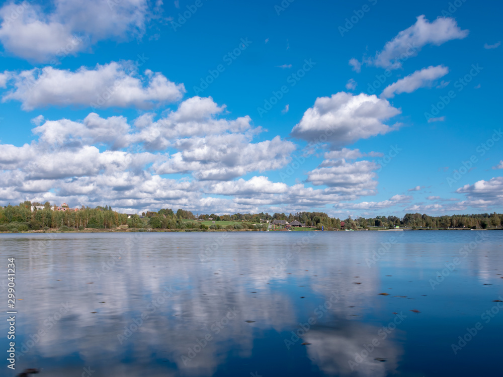 landscape with beautiful cloud reflections of lake water, calm water surface landscape with beautiful cloud reflections of lake water, calm water surface