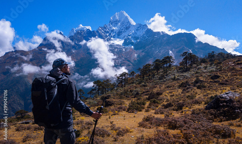 Hiking in the Himalayan mountains,open view to Mount Tamserku at horizon line