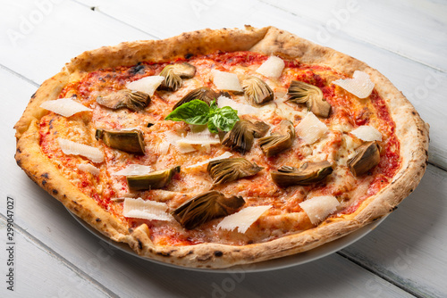 Pizza con carciofi e scaglie di grana, cucina Italiana photo