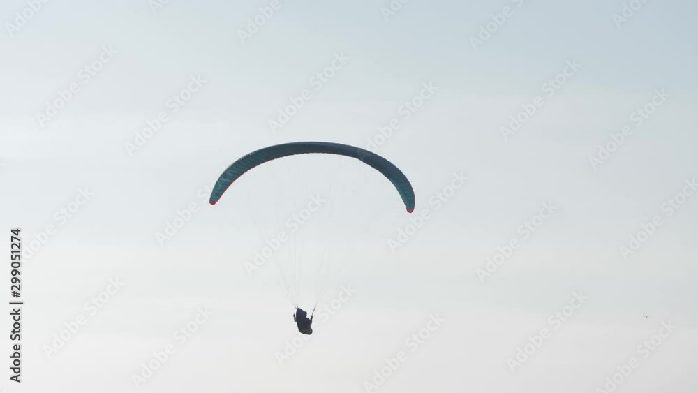 air wing with pilot soars against the sky air wing with pilot soars against the sky