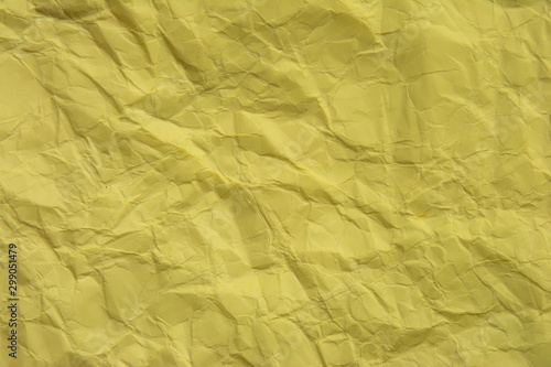Fototapeta Naklejka Na Ścianę i Meble -  Yellow creased paper texture background