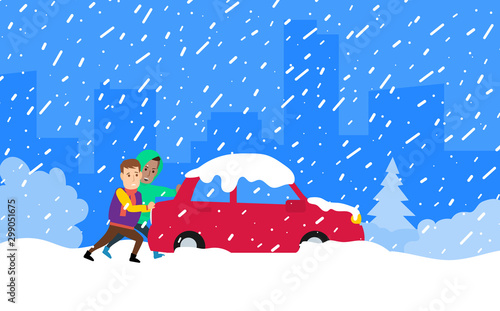 Two men push a car stuck in snow during a winter storm.